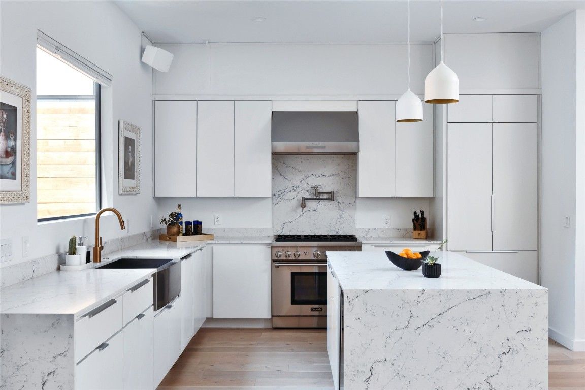 Interior, Kitchen, Marble Walls, Pendant Lights, Stainless Steel Appliances, Wood Texture Flooring