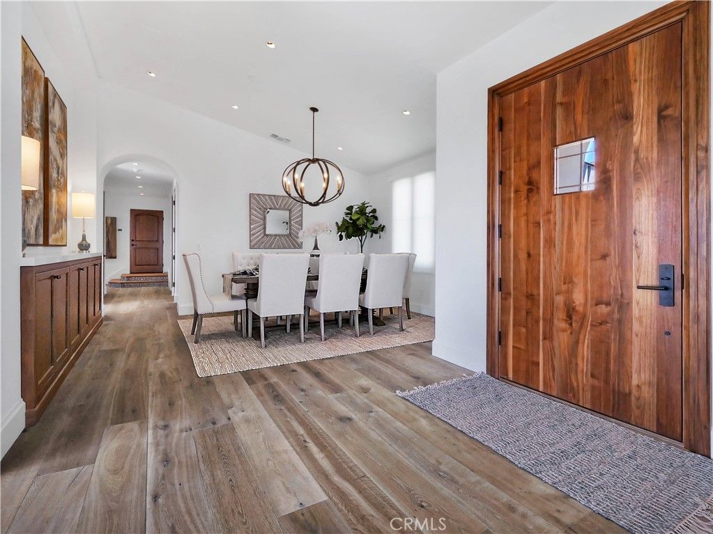 Chandelier, Dining room, Interior, Pendant Lights, Recessed Lighting, Wood Texture Flooring, Wooden Walls