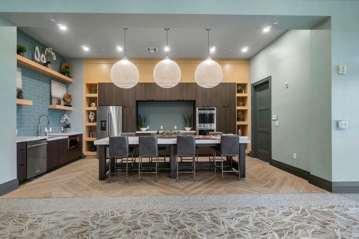 Dining room, Interior, Kitchen, Pendant Lights, Recessed Lighting, Stainless Steel Appliances, Wood Texture Flooring