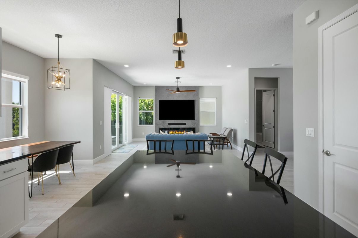 Billiard Table, Dining room, Fireplace, Game Room, Interior, Living room, Pendant Lights, Recessed Lighting, Wood Texture Flooring