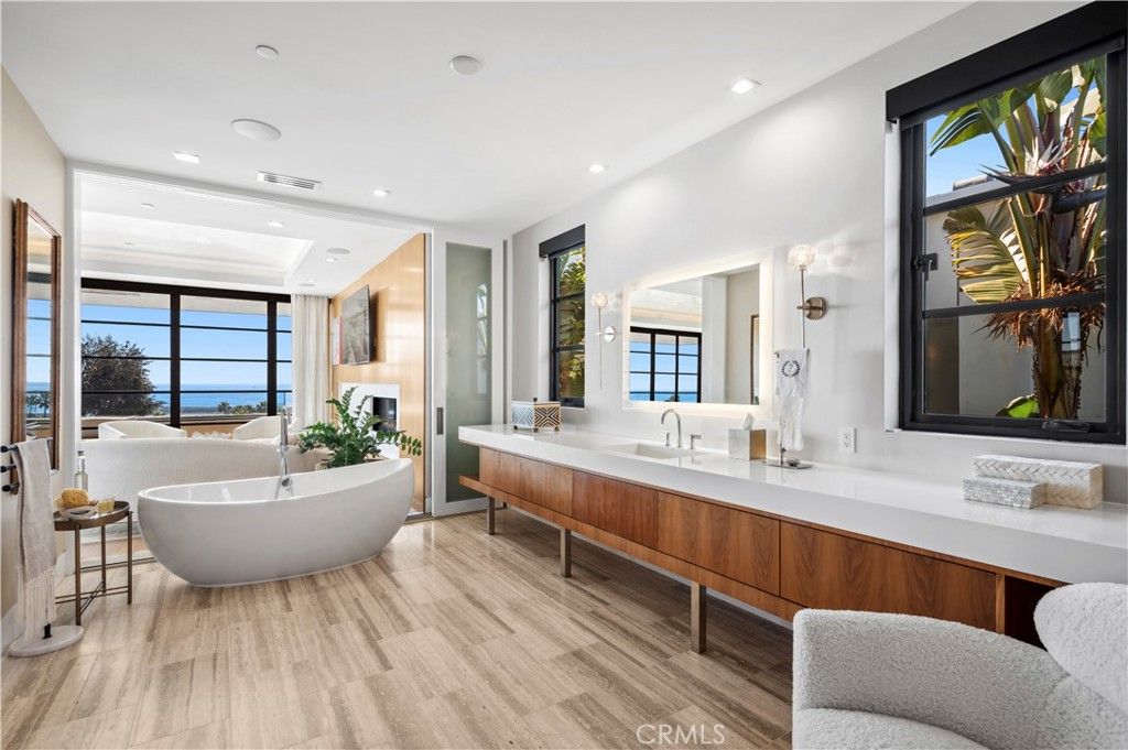 Bathroom, Fireplace, Free Standing Baths, Interior, Recessed Lighting, Water, Wood Texture Flooring