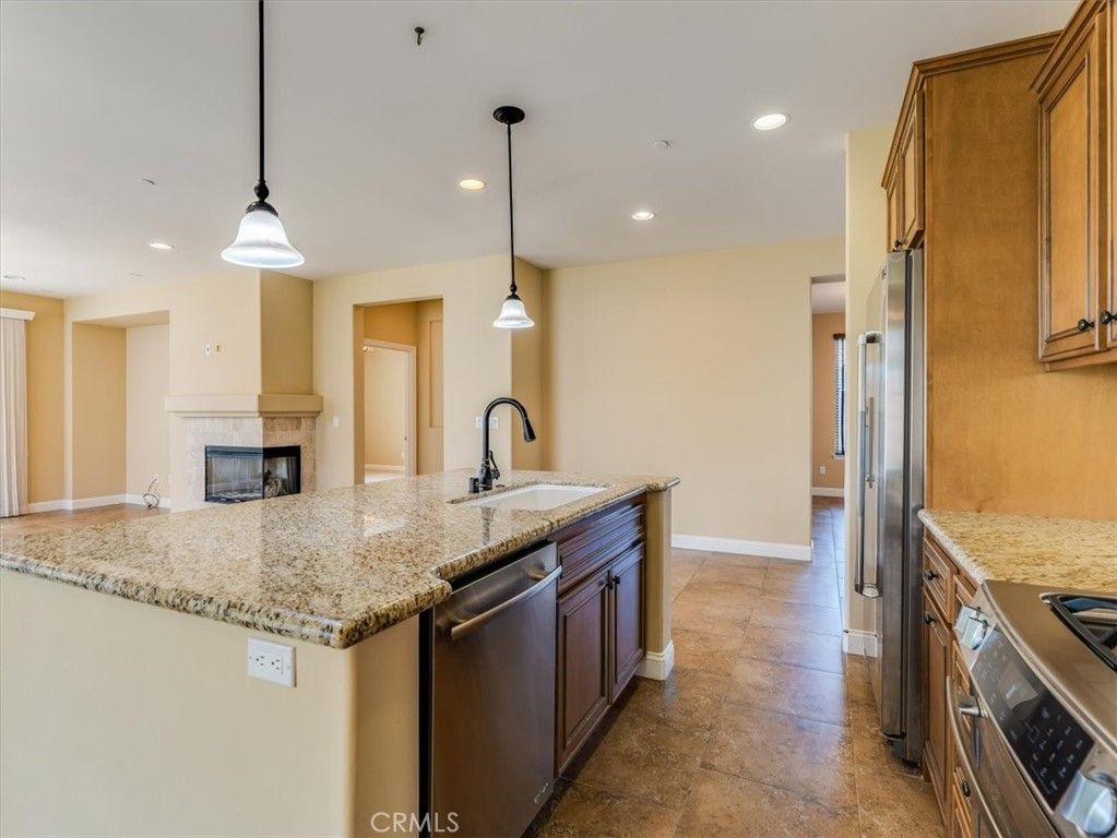 Fireplace, Interior, Kitchen, Pendant Lights, Recessed Lighting, Stainless Steel Appliances