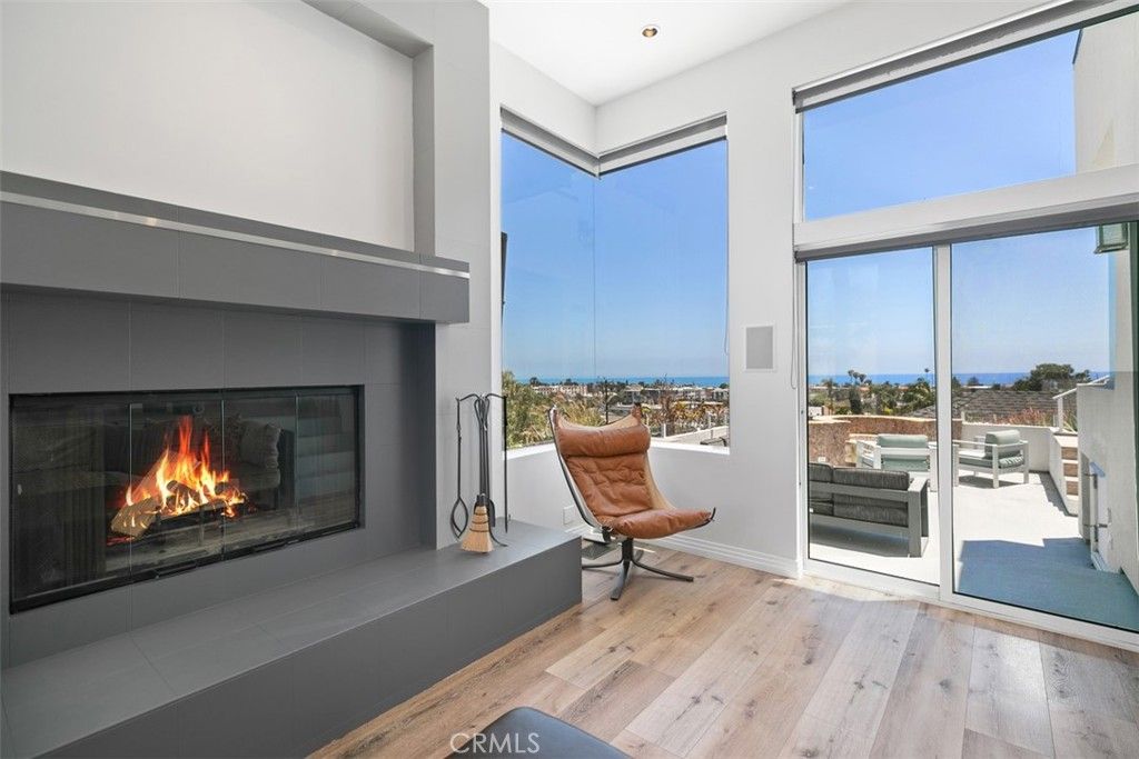 Fireplace, Interior, Recessed Lighting, Water, Wood Texture Flooring