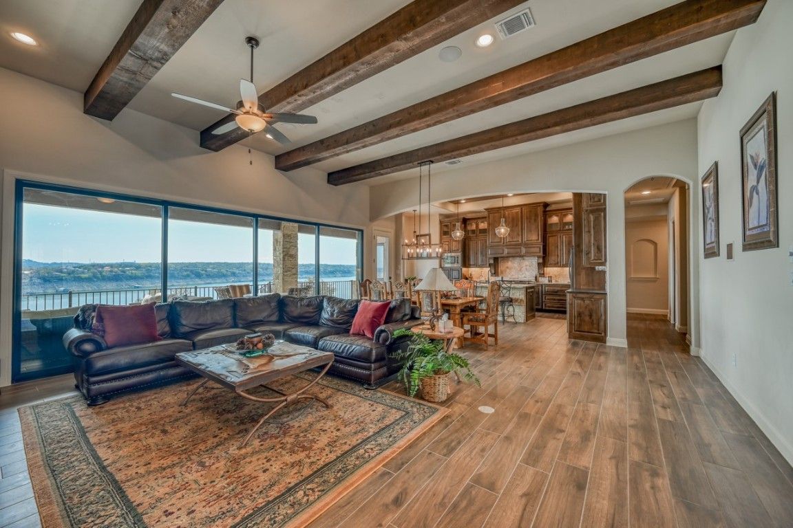 Dining room, Interior, Kitchen, Living room, Pendant Lights, Recessed Lighting, Water, Wooden Beams, Wood Texture Flooring