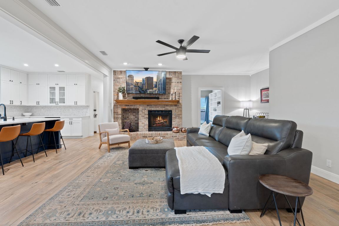 Fireplace, Interior, Kitchen, Living room, Recessed Lighting, Stone Walls, Wood Texture Flooring