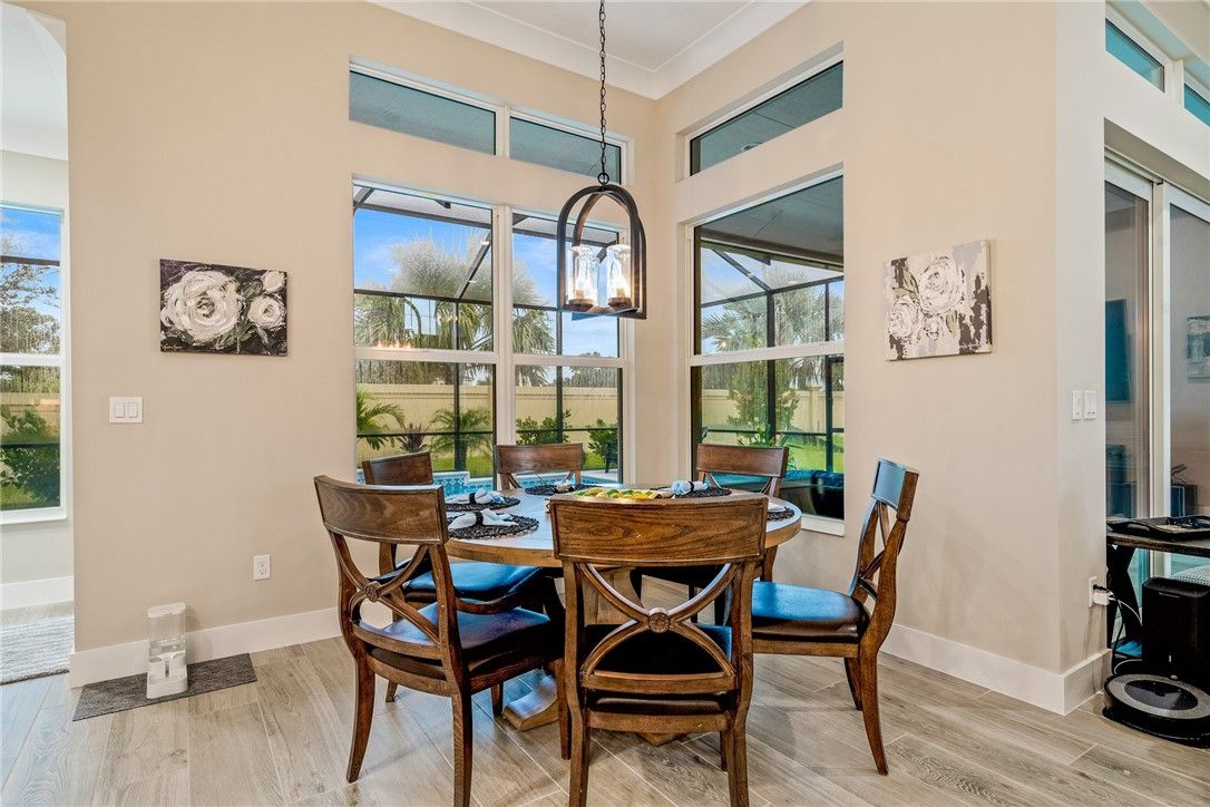 Dining room, Interior, Pendant Lights, Sun Room, Wood Texture Flooring