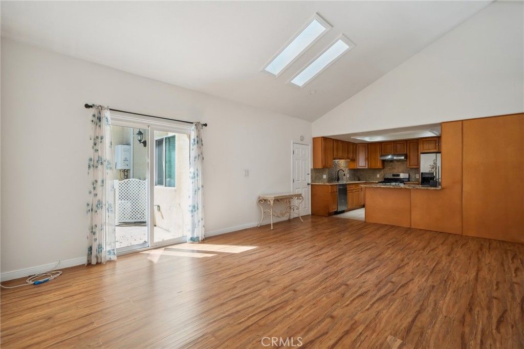 Empty room, Interior, Kitchen, Stainless Steel Appliances, Wood Texture Flooring