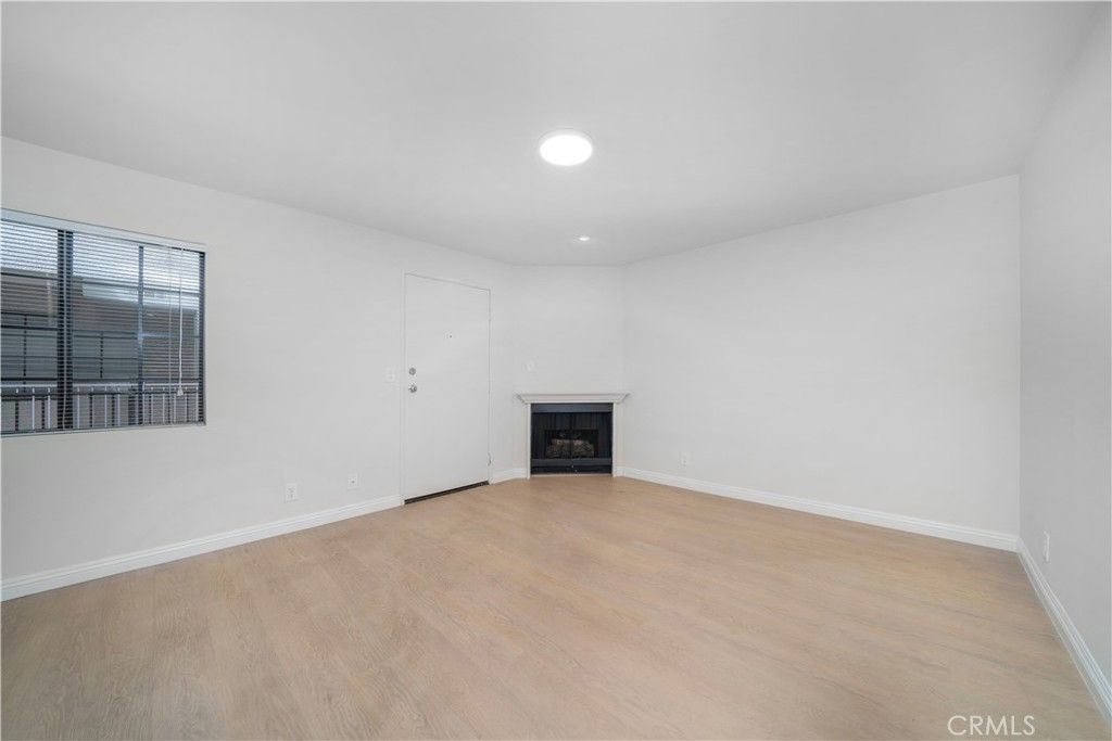 Empty room, Fireplace, Interior, Recessed Lighting, Wood Texture Flooring