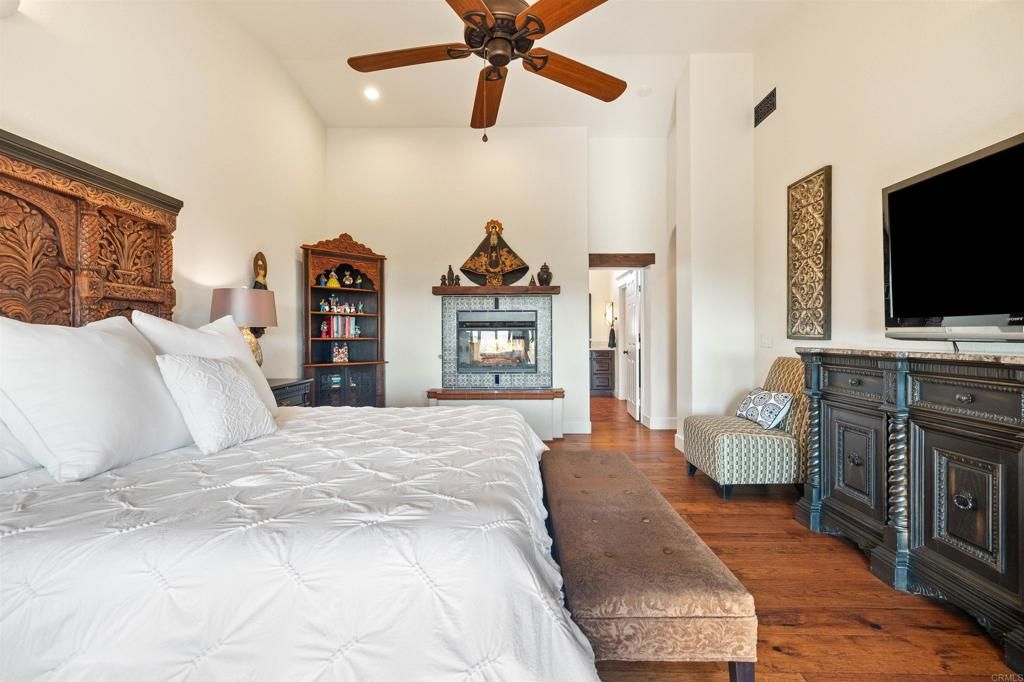 Bedroom, Fireplace, Interior, Recessed Lighting, Wood Texture Flooring
