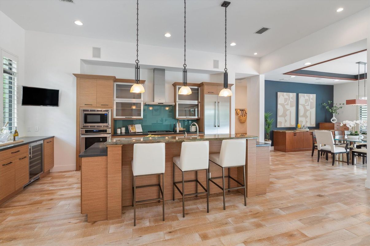 Dining room, Interior, Kitchen, Pendant Lights, Recessed Lighting, Stainless Steel Appliances, Wood Texture Flooring