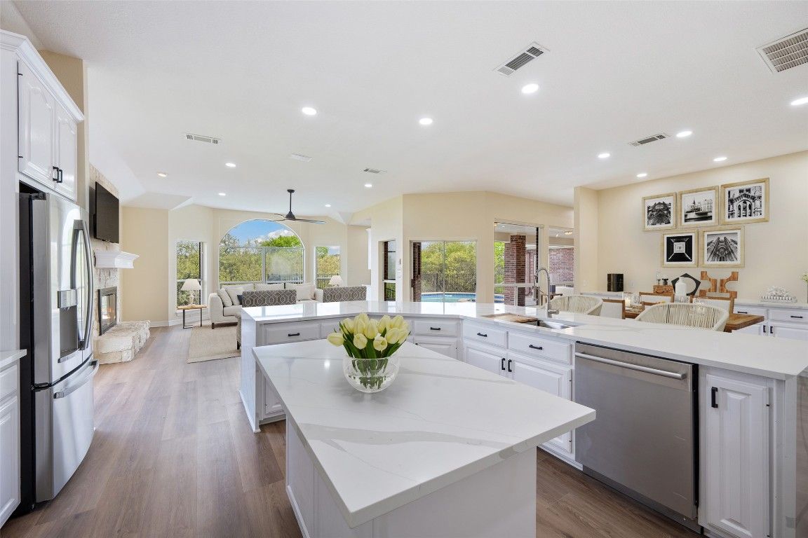 Fireplace, Interior, Kitchen, Living room, Recessed Lighting, Wood Texture Flooring