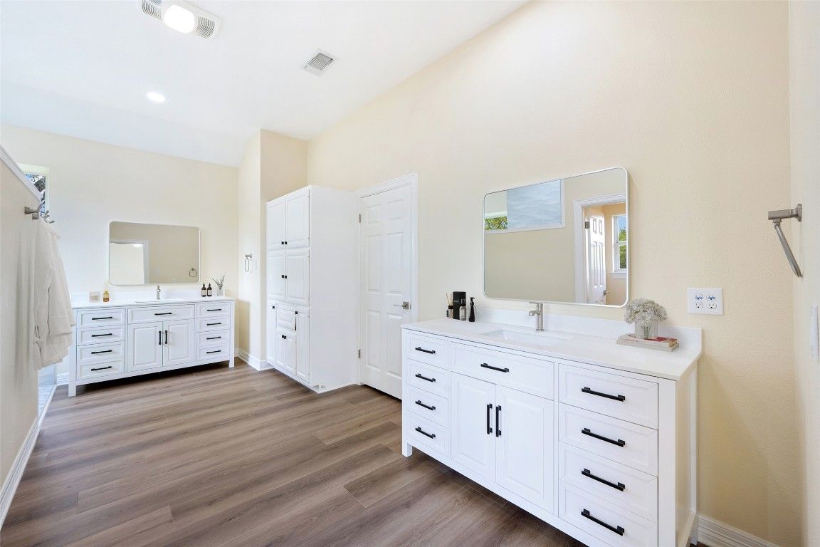 Bathroom, Dual Sink Vanities, Interior, Recessed Lighting, Wood Texture Flooring