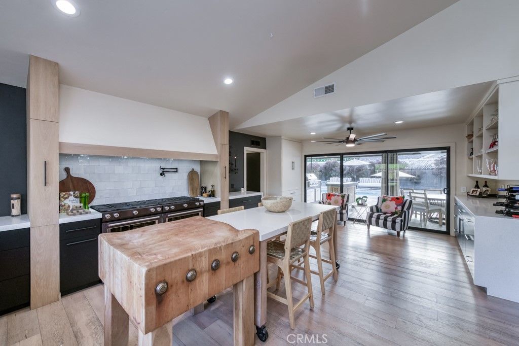 Dining room, Interior, Kitchen, Recessed Lighting, Stainless Steel Appliances, Wood Texture Flooring