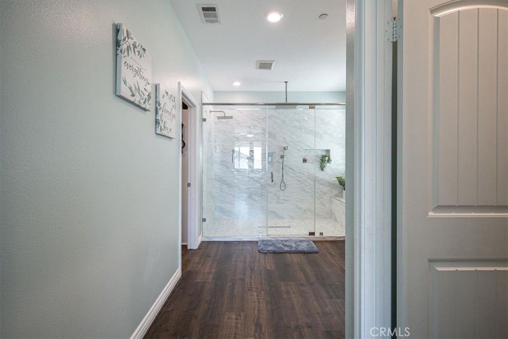 Bathroom, Glass Shower, Interior, Marble Walls, Recessed Lighting, Wood Texture Flooring