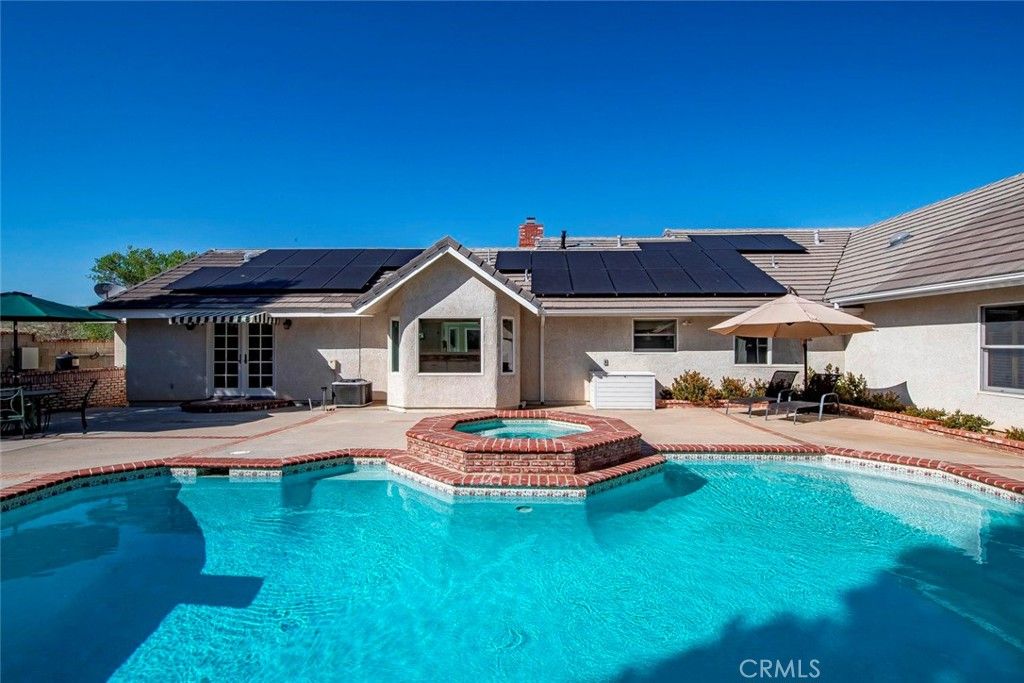 Exterior, Pool, Solar Panels