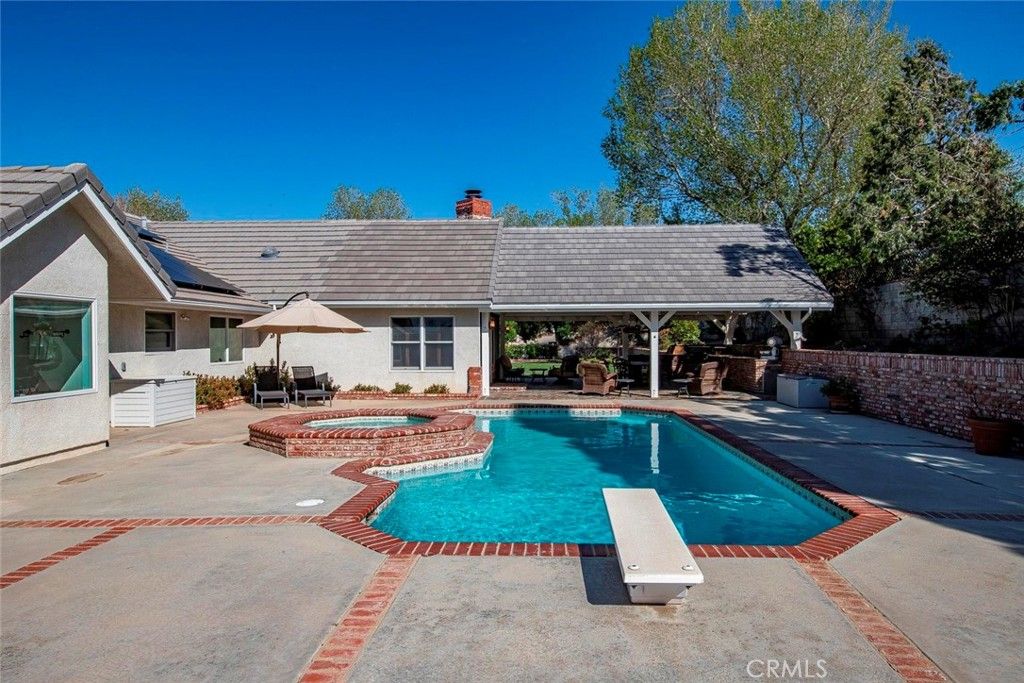 Exterior, Pool, Solar Panels