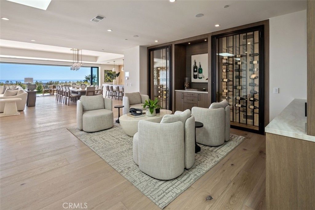 Dining room, Interior, Living room, Pendant Lights, Recessed Lighting, Water, Wine Storage, Wood Texture Flooring