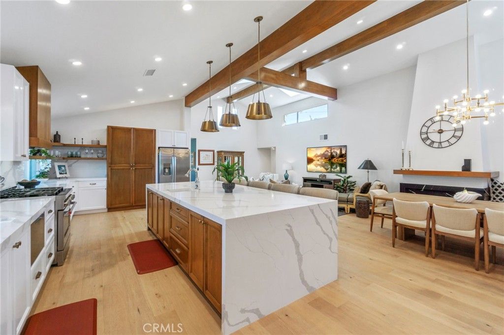 Dining room, Interior, Kitchen, Living room, Pendant Lights, Recessed Lighting, Stainless Steel Appliances, Wooden Beams, Wood Texture Flooring