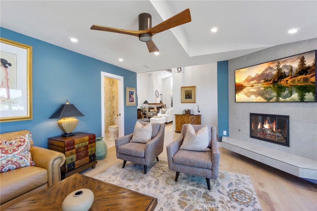 Dining room, Fireplace, Interior, Living room, Recessed Lighting, Wood Texture Flooring