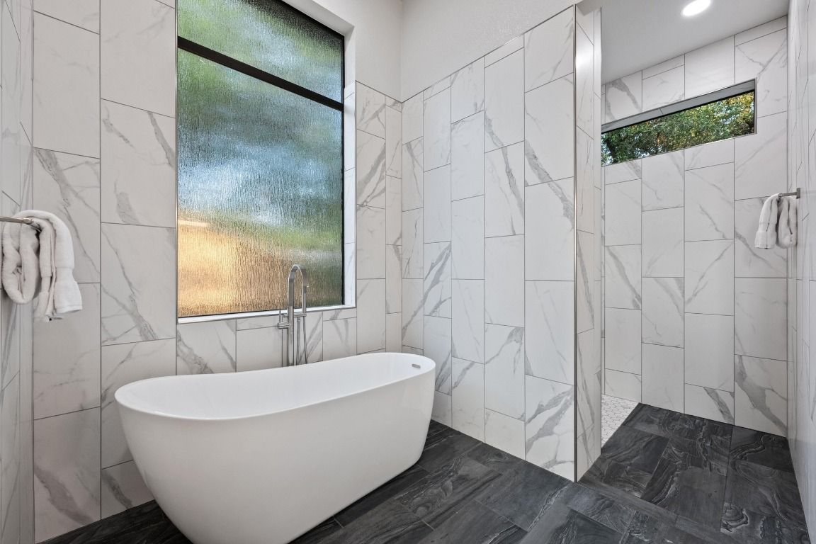 Bathroom, Free Standing Baths, Interior, Marble Walls, Recessed Lighting, Wood Texture Flooring