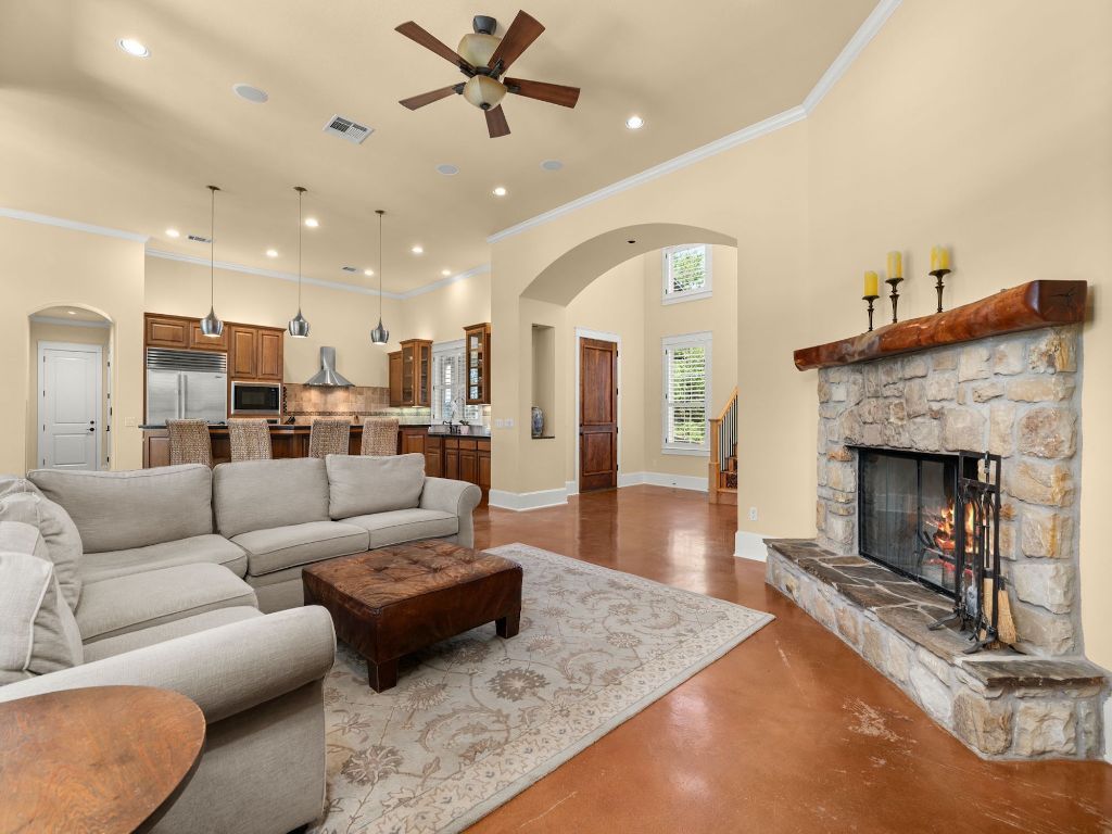 Fireplace, Interior, Kitchen, Living room, Pendant Lights, Recessed Lighting, Stainless Steel Appliances, Wood Texture Flooring
