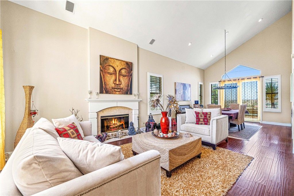 Dining room, Fireplace, Interior, Living room, Pendant Lights, Recessed Lighting, Wood Texture Flooring
