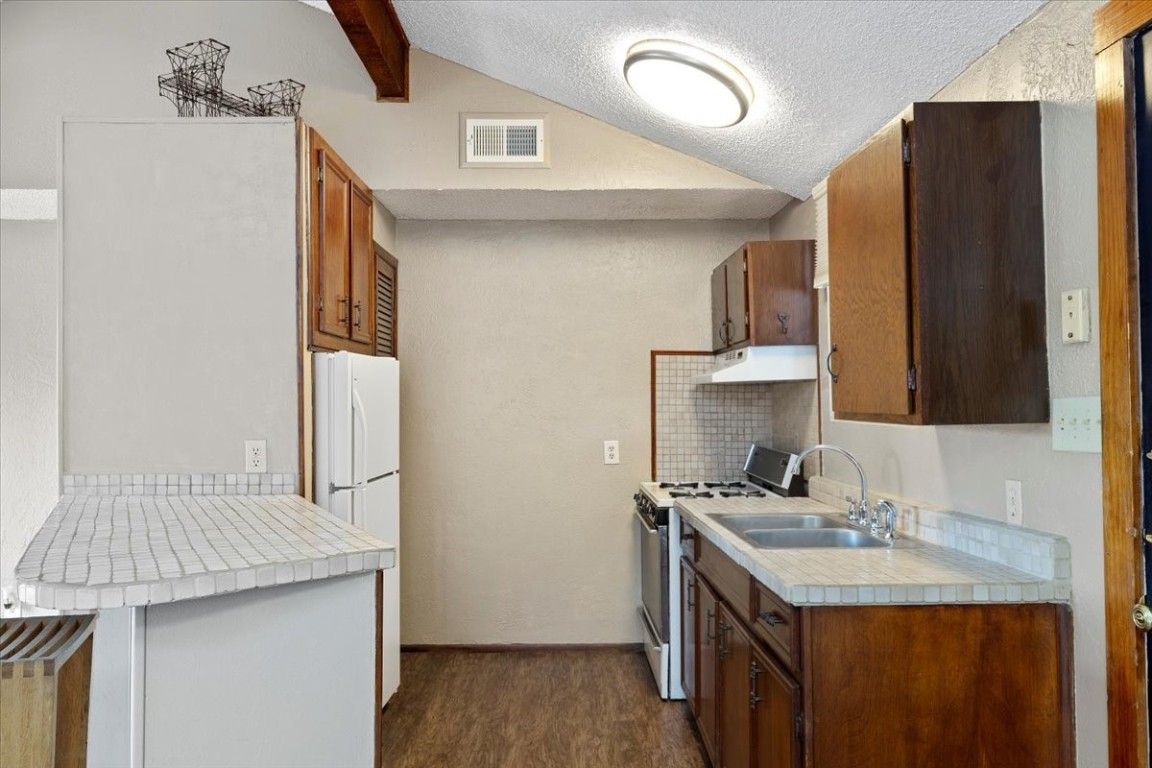 Interior, Kitchen, Tile Countertops, Wood Texture Flooring
