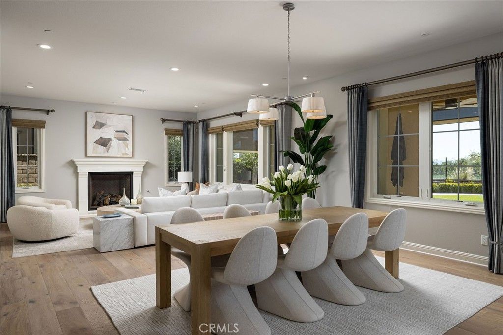 Dining room, Fireplace, Interior, Living room, Pendant Lights, Recessed Lighting, Wood Texture Flooring