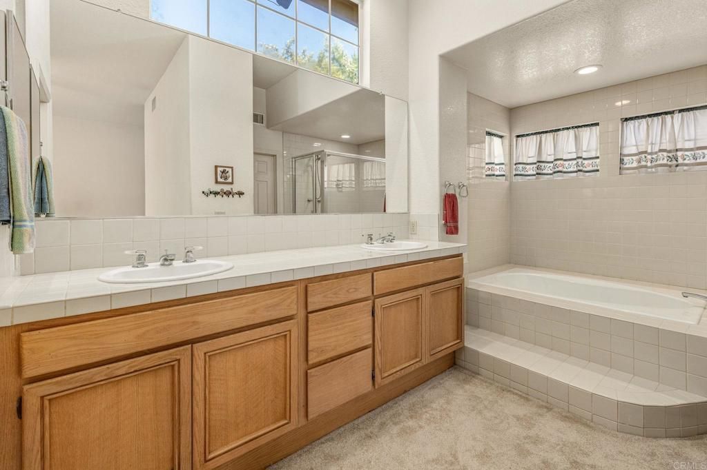 Bathroom, Dual Sink Vanities, Interior, Recessed Lighting, Tile Countertops
