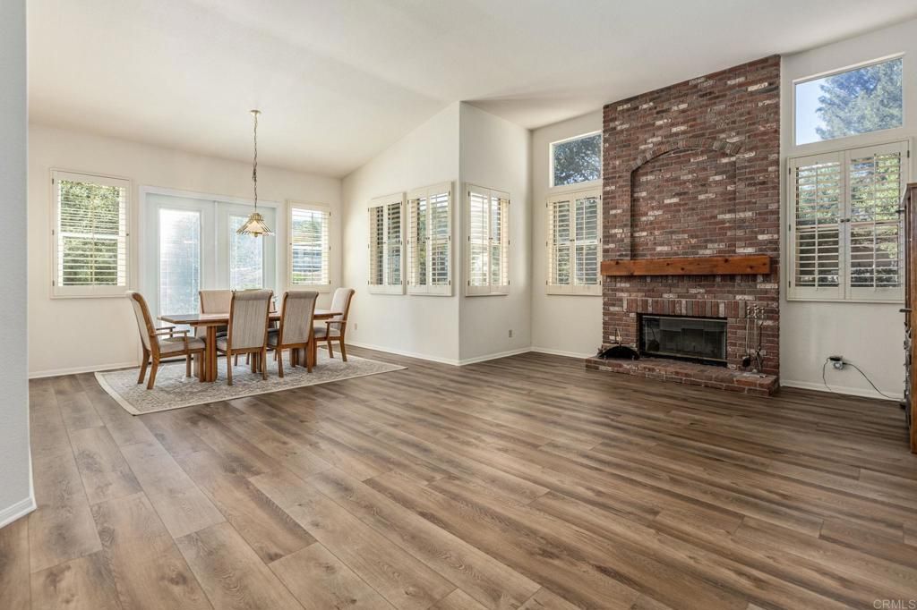 Dining room, Fireplace, Interior, Pendant Lights, Stone Walls, Wood Texture Flooring
