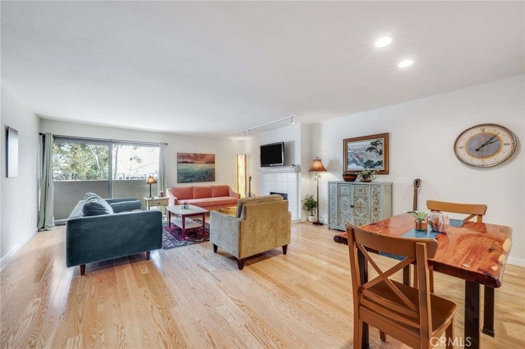 Dining room, Fireplace, Interior, Living room, Recessed Lighting, Wood Texture Flooring