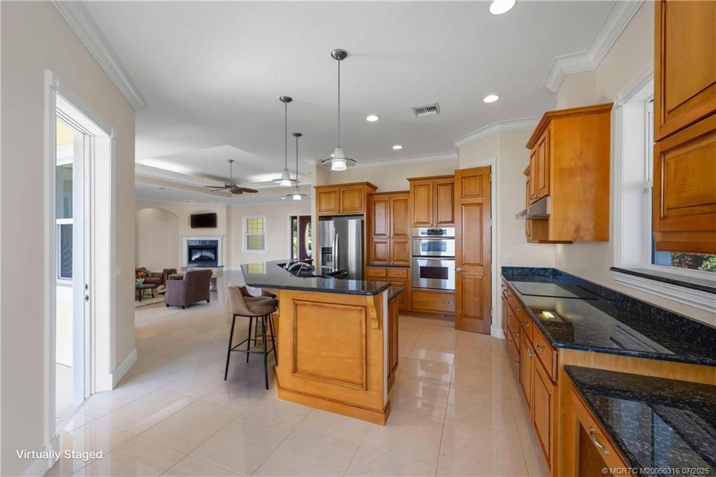 Fireplace, Interior, Kitchen, Living room, Pendant Lights, Recessed Lighting, Stainless Steel Appliances