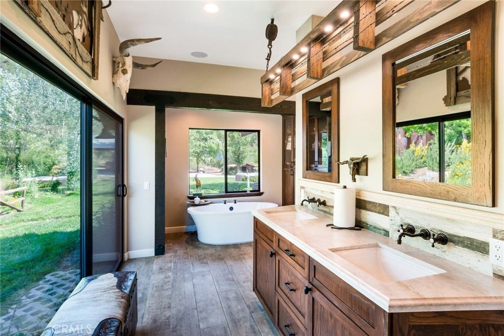 Bathroom, Dual Sink Vanities, Free Standing Baths, Interior, Pendant Lights, Recessed Lighting, Wood Texture Flooring