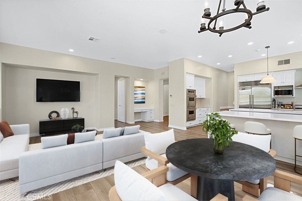 Dining room, Interior, Kitchen, Living room, Pendant Lights, Recessed Lighting, Stainless Steel Appliances, Wood Texture Flooring