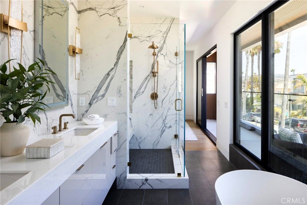 Bathroom, Dual Sink Vanities, Free Standing Baths, Glass Shower, Interior, Marble Walls, Wood Texture Flooring