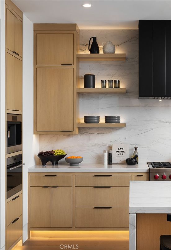 Interior, Kitchen, Marble Walls, Recessed Lighting, Stainless Steel Appliances