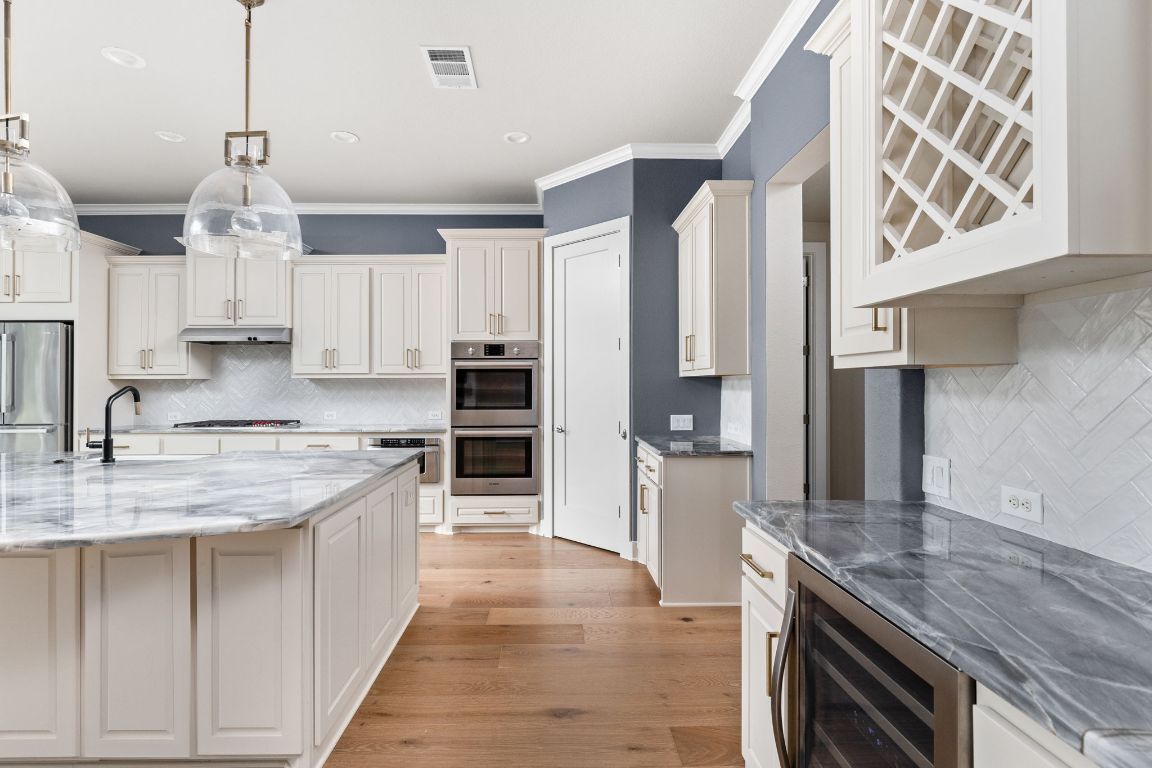 Interior, Kitchen, Pendant Lights, Recessed Lighting, Stainless Steel Appliances, Wood Texture Flooring