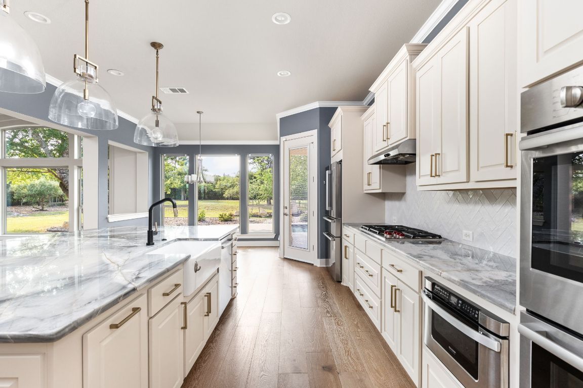Interior, Kitchen, Pendant Lights, Recessed Lighting, Stainless Steel Appliances, Wood Texture Flooring
