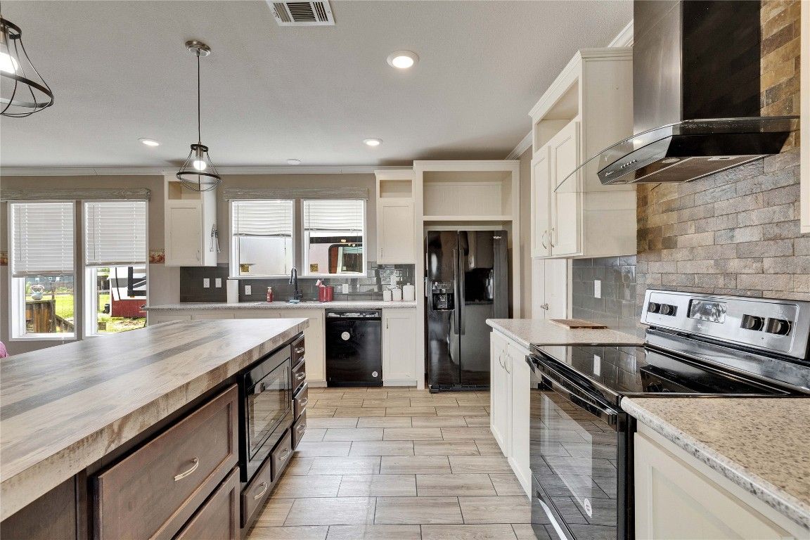 Interior, Kitchen, Pendant Lights, Recessed Lighting, Stainless Steel Appliances, Stone Walls