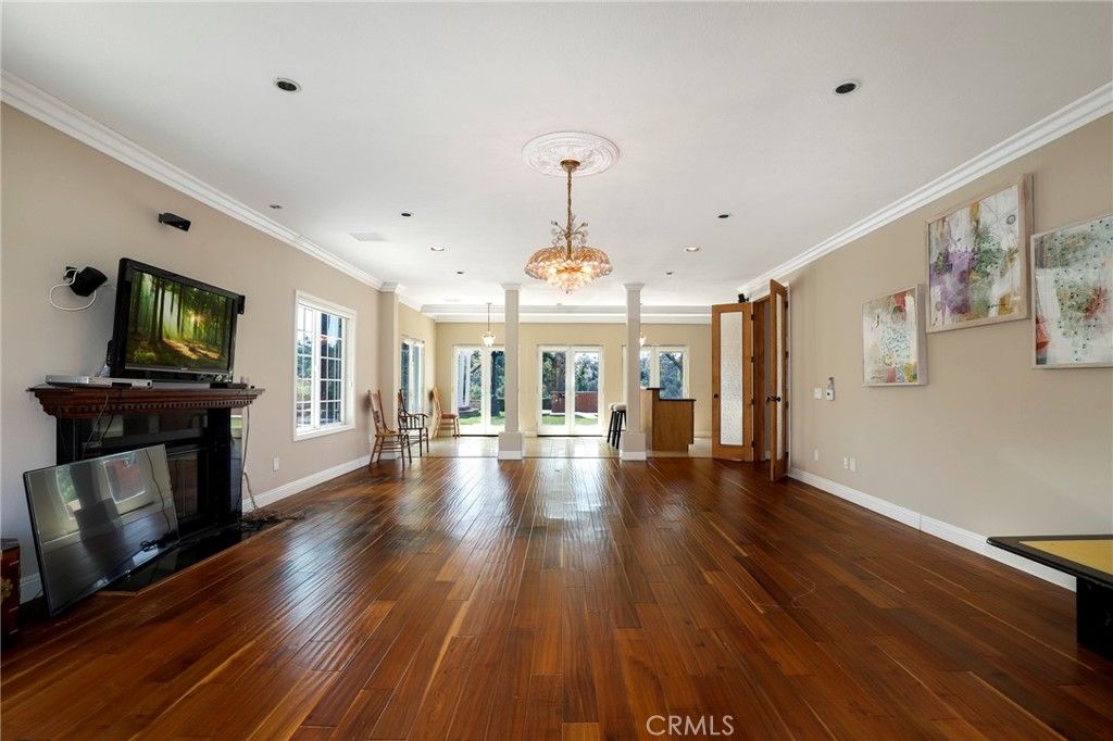 Chandelier, Fireplace, Interior, Recessed Lighting, Wood Texture Flooring