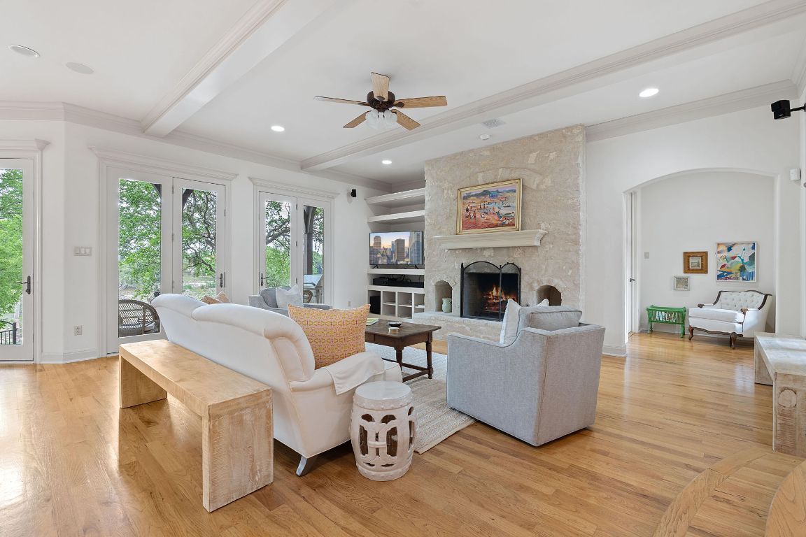 Fireplace, Interior, Living room, Recessed Lighting, Stone Walls, Wood Texture Flooring