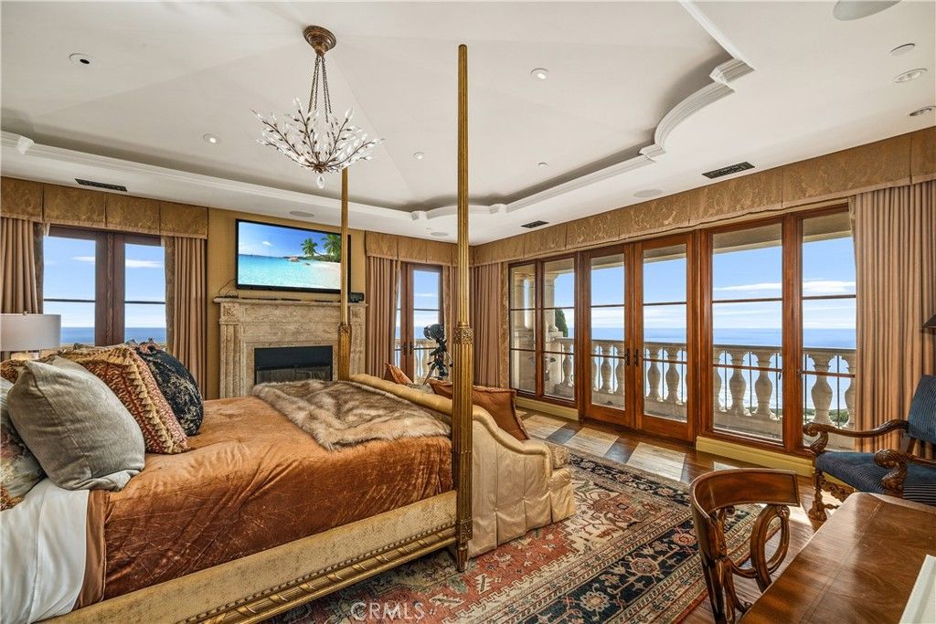 Bedroom, Fireplace, Interior, Recessed Lighting, Water, Wood Texture Flooring
