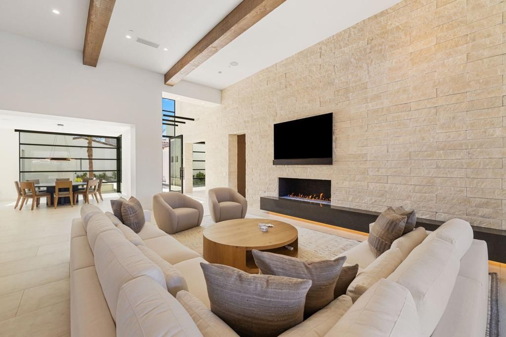 Dining room, Fireplace, Interior, Living room, Recessed Lighting, Stone Walls, Wooden Beams