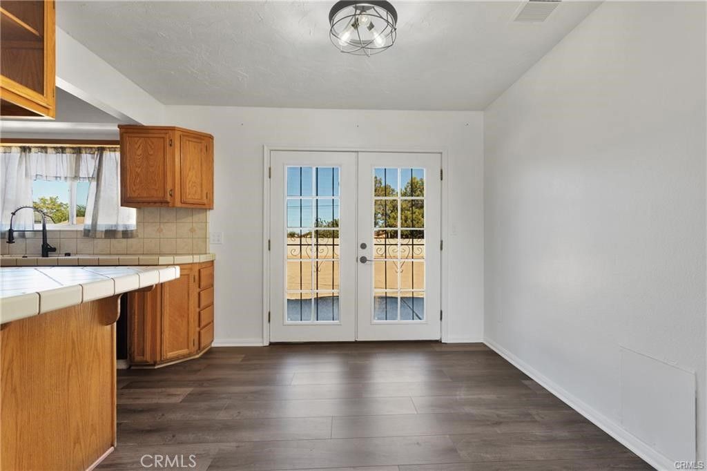 Interior, Kitchen, Tile Countertops, Wood Texture Flooring