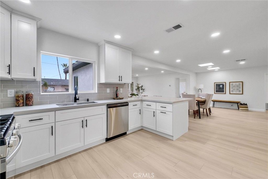 Dining room, Interior, Kitchen, Recessed Lighting, Stainless Steel Appliances, Wood Texture Flooring