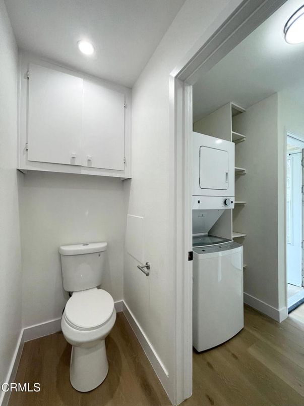 Bathroom, Interior, Recessed Lighting, Utility Closets, Washer, Wood Texture Flooring
