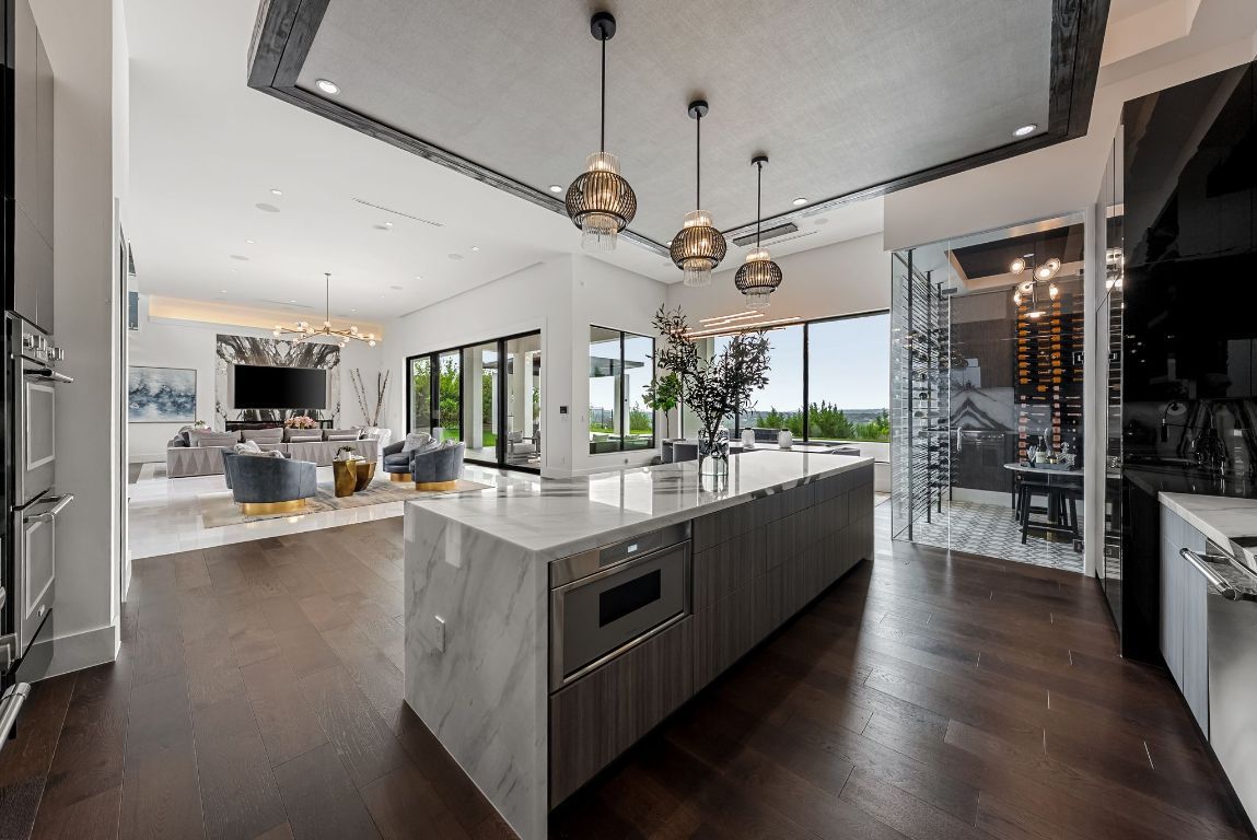 Dining room, Fireplace, Interior, Kitchen, Living room, Pendant Lights, Recessed Lighting, Stainless Steel Appliances, Wine Storage, Wood Texture Flooring