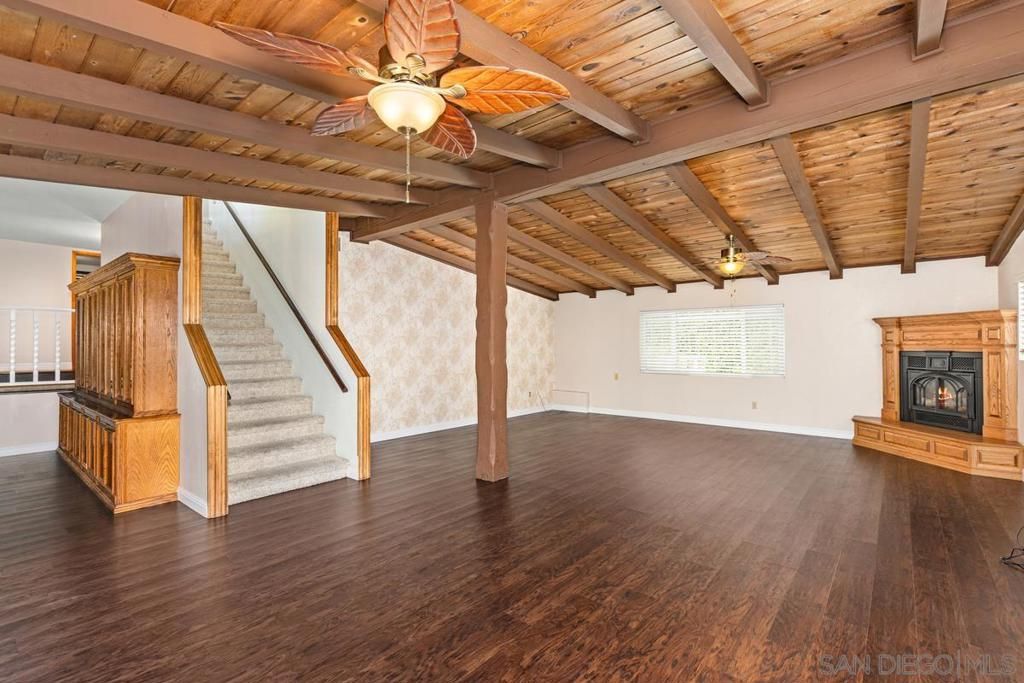 Chandelier, Empty room, Fireplace, Interior, Wooden Beams, Wooden Ceilings, Wood Texture Flooring