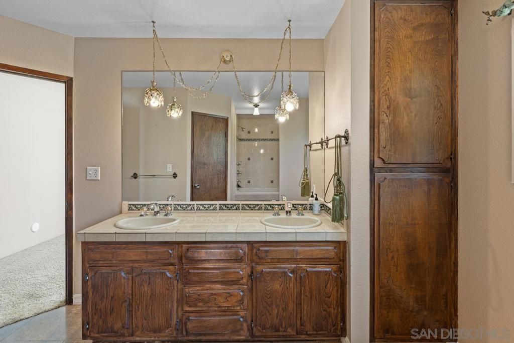 Bathroom, Dual Sink Vanities, Interior, Pendant Lights, Tile Countertops