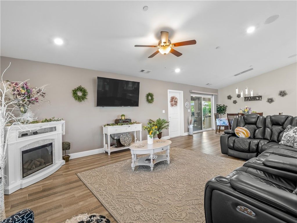 Home Theatre Room, Fireplace, Interior, Living room, Pendant Lights, Recessed Lighting, Wood Texture Flooring